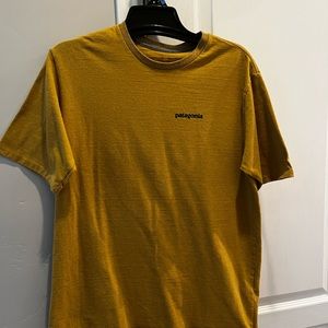 Yellow Patagonia mens regular fit medium short sleeved t-shirt.